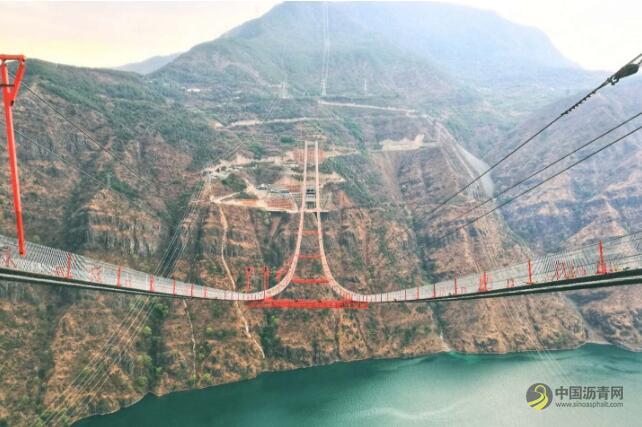 云南：华丽高速公路金安金沙江大桥猫道贯通 沥青网，sinoasphalt.com