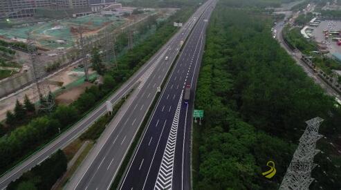 1.5cm大象静音型超薄沥青路面西安绕城高速公路成功应用 沥青网，sinoasphalt.com