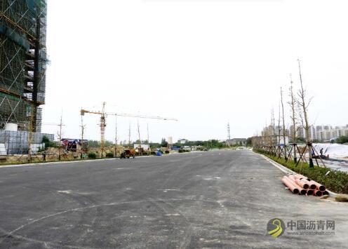 部分路段摊铺底层沥青 明年初江都路南延至新328国道 沥青网，sinoasphalt.com